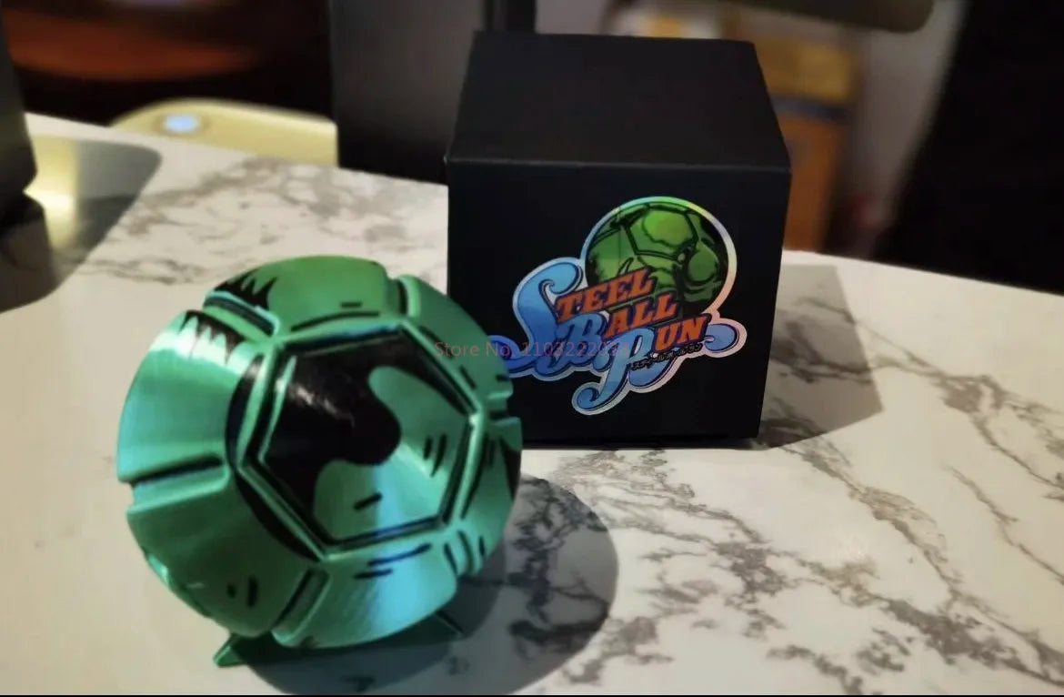 A teal, faceted steel ball fidget toy is displayed in front of a black box labeled Steel Ball Run.
