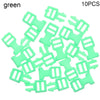 A collection of ten green mini plastic buckles for DIY crafts and outdoor gear.
