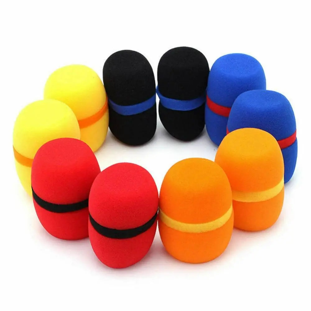 A set of five foam microphone windscreen covers in black, yellow, and blue colors arranged in a circle.