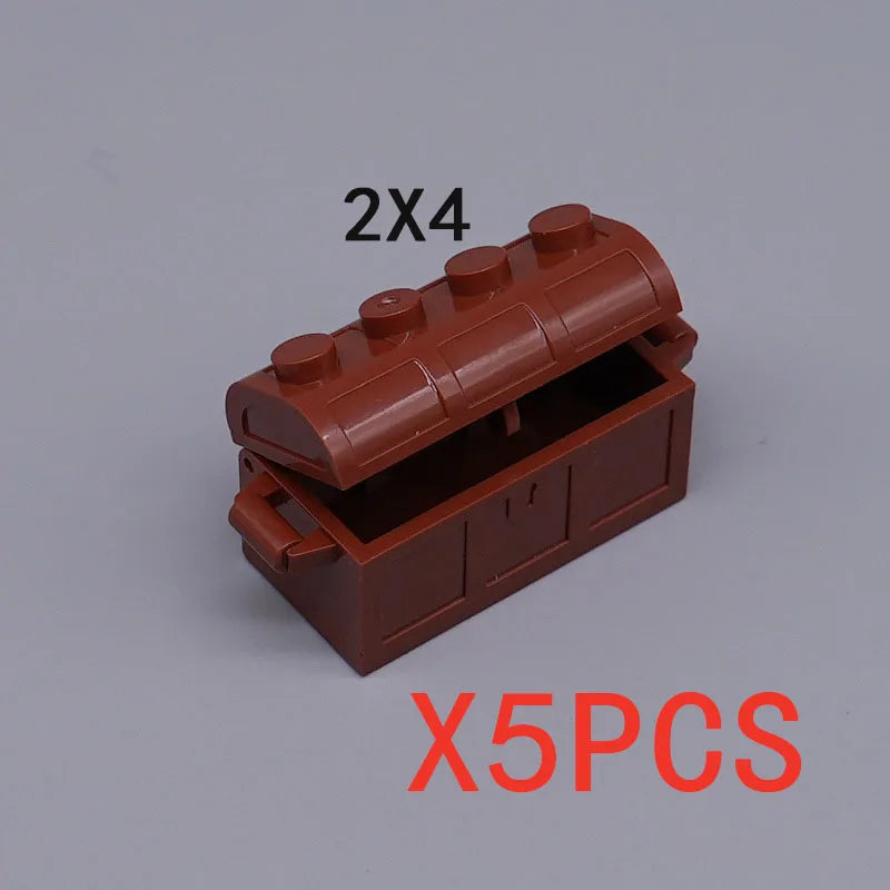 Two brown building blocks shaped like an open treasure chest, used as a set of five pieces.
