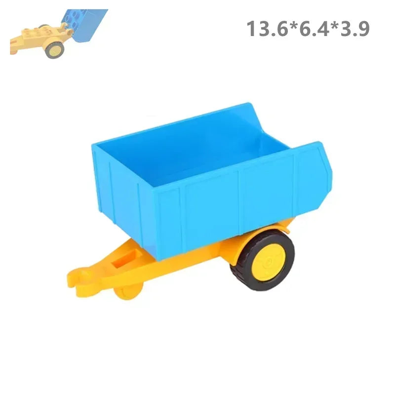 A yellow toy dump truck with a blue cargo box and wheels.