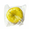 A yellow kiwi and watermelon smoothie slime squishy stress relief toy in a clear plastic bag.