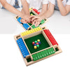 A wooden shut the box dice game with colored dice and numbered wooden blocks for 2-4 players.
