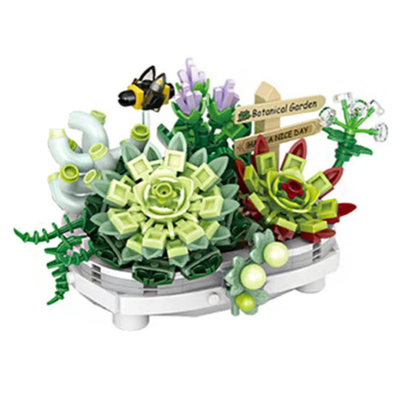 A building block set featuring a floral bouquet display with green succulents, purple flowers, and a bee figure.