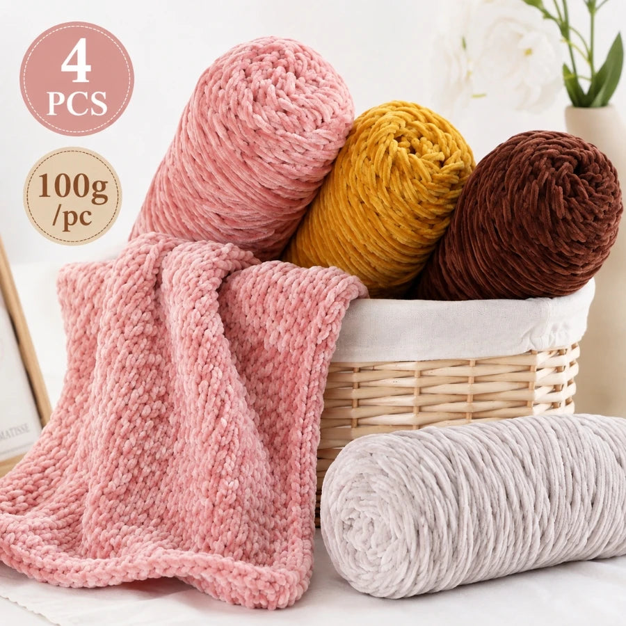 Four skeins of soft pink, yellow, and brown chenille yarn for crochet and knitting projects.