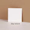 A white square jewelry display card is shown against a beige background with the text 50p 5x5cm below it.