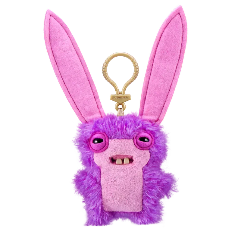 A purple plush monster keychain featuring rabbit ears and a face with large eyes.