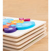 A wooden life cycle learning puzzle for toddlers featuring colorful, interlocking pieces stacked on a light wooden surface.
