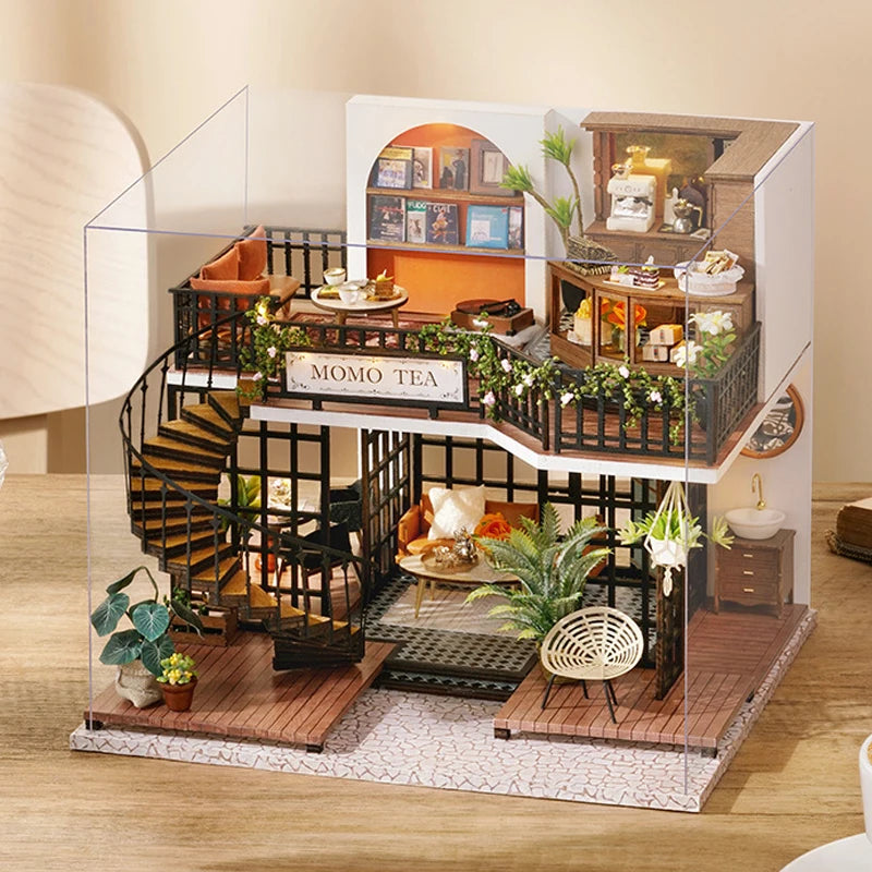 A detailed miniature dollhouse puzzle kit featuring a multi-story wooden structure with climbing stairs and decorative elemen
