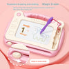 A pink magnetic drawing board for kids with a grid surface and a purple eraser tool is shown.