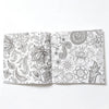 An open 24-page mandala coloring book featuring intricate black and white floral and swirling patterns.