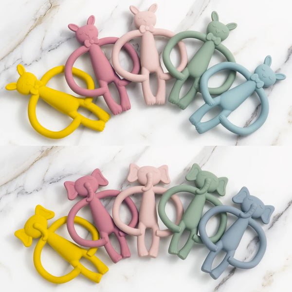 A collection of silicone teething toys shaped like various animals in pink, yellow, and green colors.