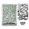Bag of white flat-back resin rhinestones for DIY craft and nail art
