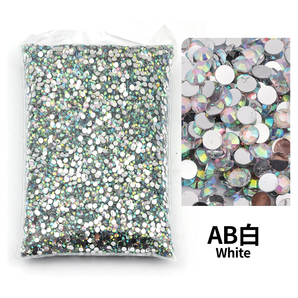 Bag of white flat-back resin rhinestones for DIY craft and nail art