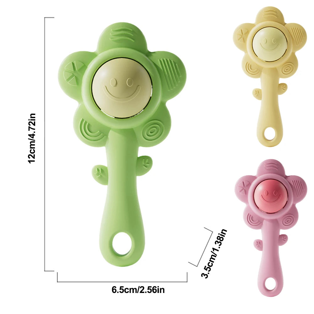 A set of three sensory teething rattles in light green, yellow, and pink for babies.