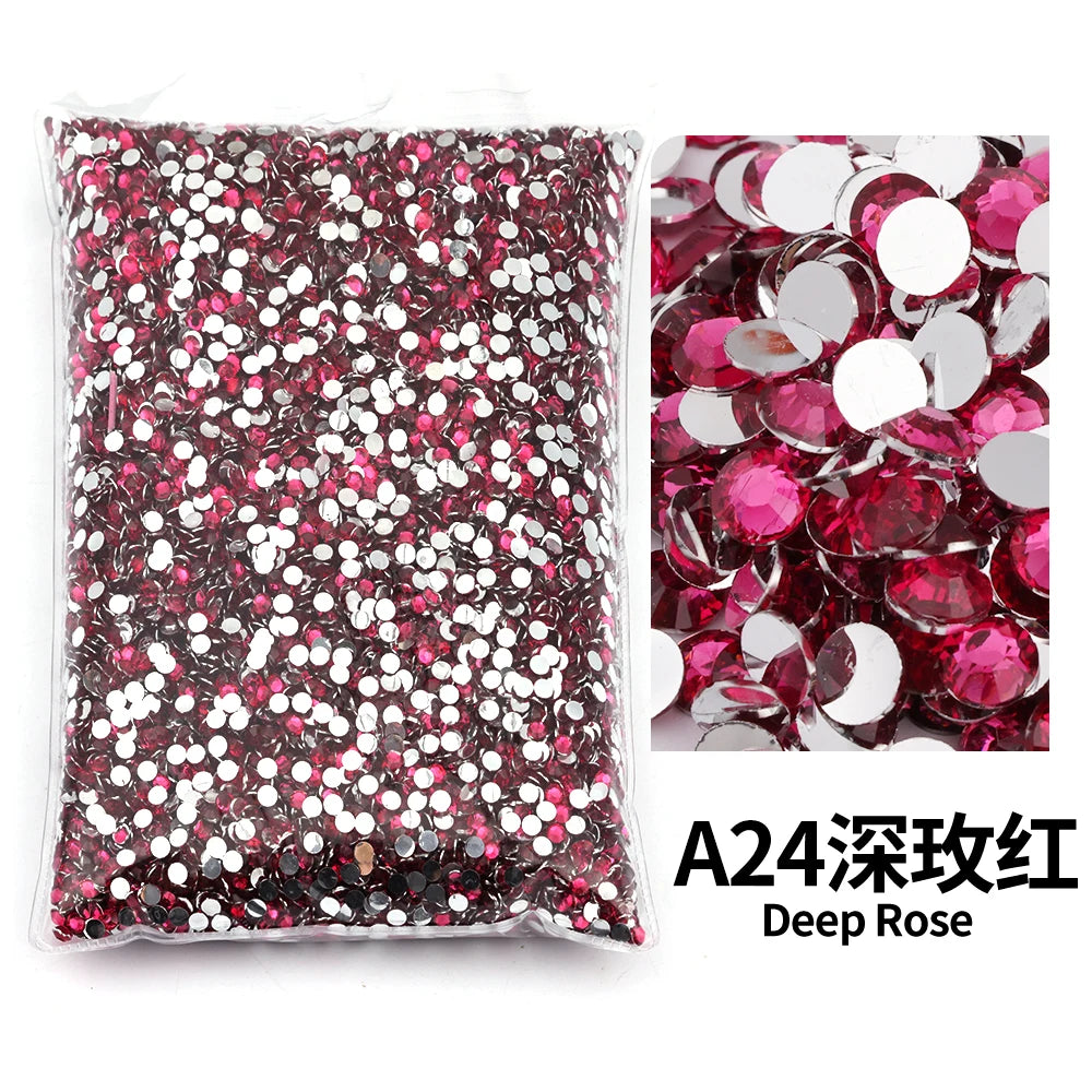 Bag of deep rose pink resin rhinestones for DIY craft and nail art