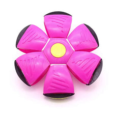 A bright pink, flower-shaped squeeze-and-throw flying saucer ball for active family fun.