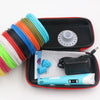 A set of colored filament spools and a blue 3D printing pen with an LCD display inside a red case.