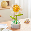 A set of rose flower building blocks featuring yellow and white petals and green stems.