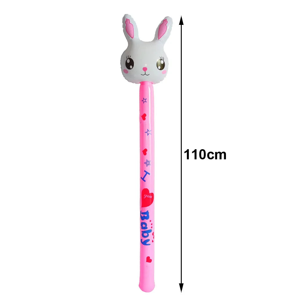A white bunny-shaped spoon for an Easter egg and spoon race game set.