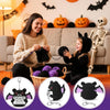 Handmade knitted bat doll with gift card featuring a black bat design on an orange background