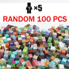 A pile of 100 random magnetic building tiles in various colors and shapes.