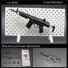A black 1/6 scale military submachine gun model kit is displayed on a white pegboard with separate bracket parts.