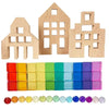 Wooden building blocks and rainbow colored acrylic blocks for creative play