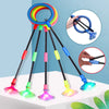 A colorful glowing skip ball with multiple sticks is shown against a blue background, demonstrating its use for active play a
