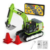 A green mini RC excavator model with a hydraulic arm and tracks, along with accessories and instructions.