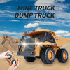 A remote control dump truck toy is shown driving on a dirt surface under a blue sky.