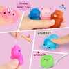 Hands show various pink and blue squishy toys being squeezed, stretched, and smoothed.