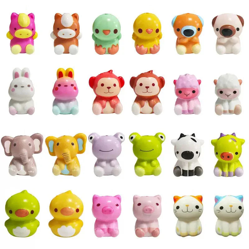 A collection of various squishy fidget toys shaped like food items including a donut, elephant, and various animals.