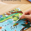 A Montessori quiet book showing shadow pairing and logical pairing activities with stickers on a wooden background.