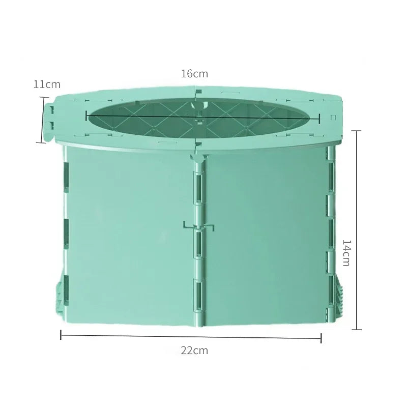 A light mint green foldable baby potty training seat with a circular opening and side panels.