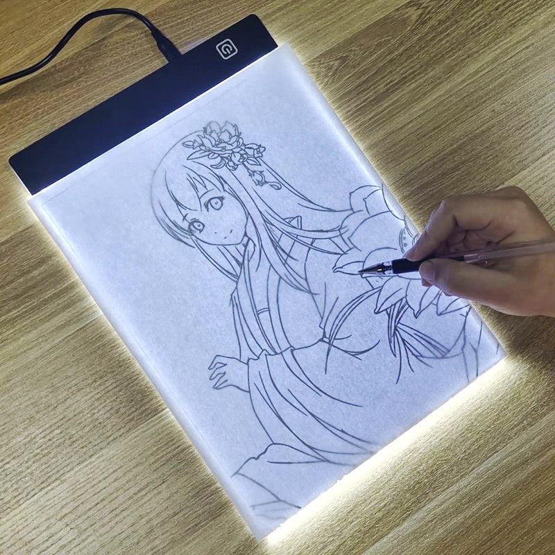 A hand draws a detailed line art of an anime girl on a transparent LED drawing board.