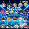 A collection of acrylic keychains featuring characters from Blue Lock including Isagi, Bachira, and Kunigami.