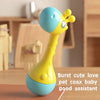 A yellow and blue soft plastic animal rattle designed as a cute baby pet coaxing good assistant.