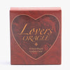 A box of Lovers Oracle tarot card deck featuring a heart-shaped design and guidance cards.
