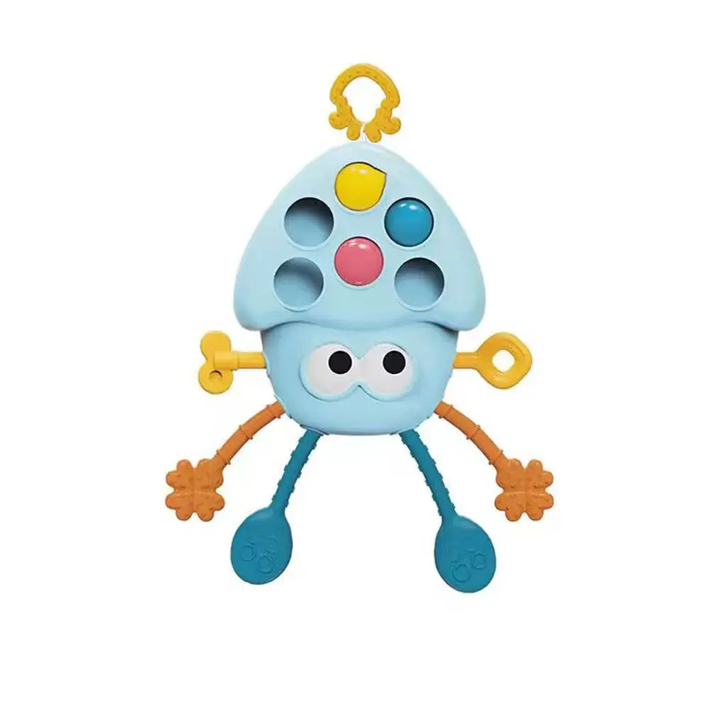 A light blue silicone sensory toy shaped like a head with yellow pull strings and colorful buttons.