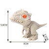A small, light gray finger dinosaur fidget toy with an open mouth and orange eye, shown from the side.