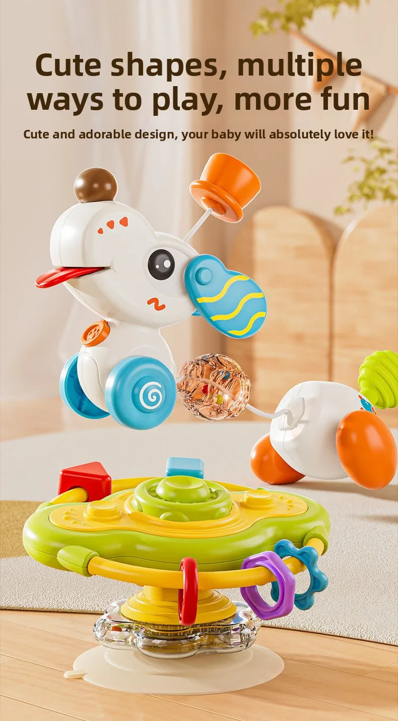 A white cartoon baby rattle toy with orange ears and blue accents is shown in a playful context.