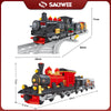 A black and red vintage steam passenger train building blocks set on a gray track.