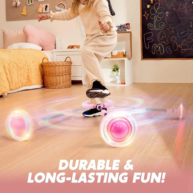 A child is playing with a glowing, bouncing ball that emits light trails on a wooden floor.
