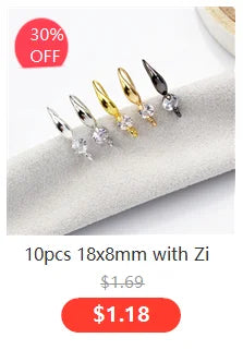A set of 10 gold-toned flattened chain connectors with zip ties for jewelry making.