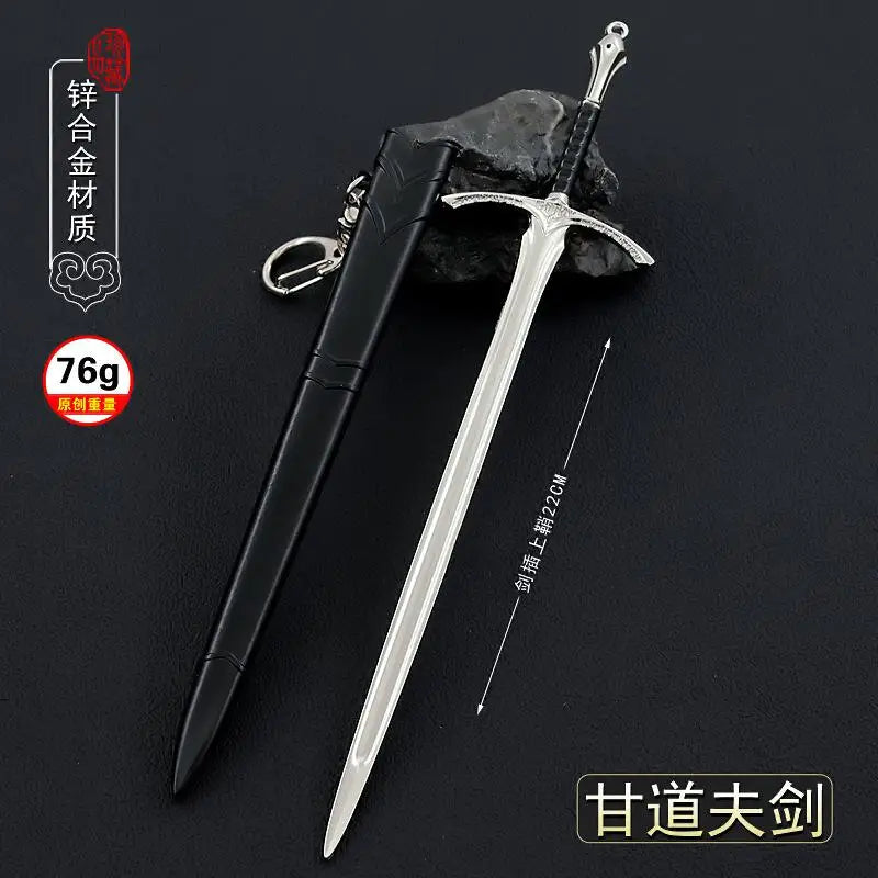 A silver replica sword with a black sheath is displayed on a dark background.