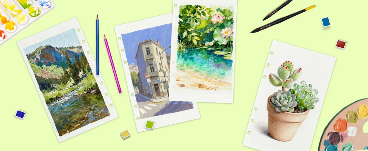 Watercolor paints, brushes, and sketchbooks featuring landscapes and nature scenes on a light green background.