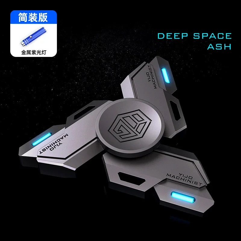 A silver metal fidget spinner with blue luminous accents, shown against a dark background.