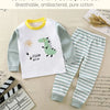 A two-piece cotton children's set featuring a dinosaur graphic on a white shirt and striped pants.