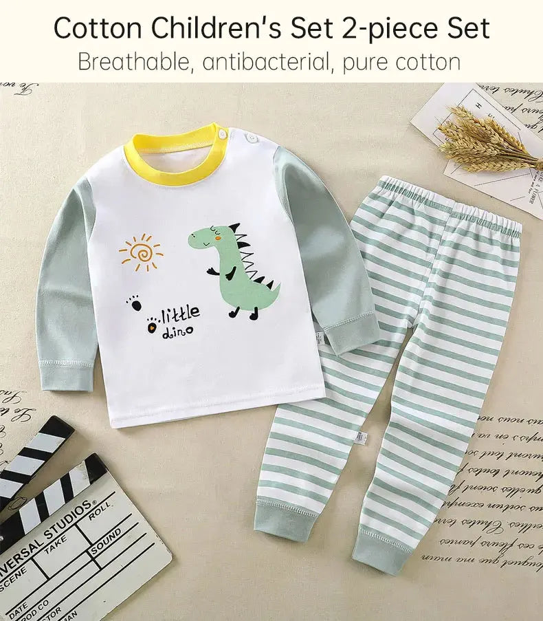 A two-piece cotton children's set featuring a dinosaur graphic on a white shirt and striped pants.